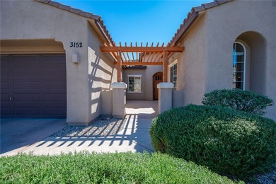 Check out this beautiful 1,966 sf 3-bedroom, plus den/office on Laughlin Ranch Golf Club in Arizona - for sale on GolfHomes.com, golf home, golf lot