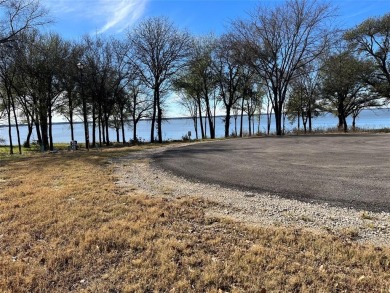 This is a .64 Acre lot with lake view, not a house. Cedar Creek on Cedar Creek Country Club in Texas - for sale on GolfHomes.com, golf home, golf lot