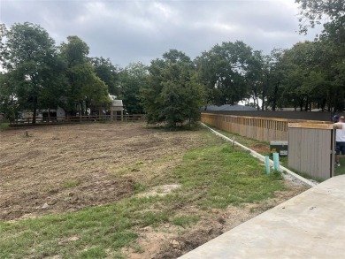 This is a .64 Acre lot with lake view, not a house. Cedar Creek on Cedar Creek Country Club in Texas - for sale on GolfHomes.com, golf home, golf lot