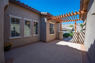 Check out this beautiful 1,966 sf 3-bedroom, plus den/office on Laughlin Ranch Golf Club in Arizona - for sale on GolfHomes.com, golf home, golf lot