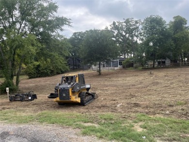 This is a .64 Acre lot with lake view, not a house. Cedar Creek on Cedar Creek Country Club in Texas - for sale on GolfHomes.com, golf home, golf lot