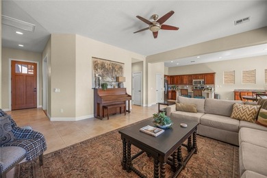 Check out this beautiful 1,966 sf 3-bedroom, plus den/office on Laughlin Ranch Golf Club in Arizona - for sale on GolfHomes.com, golf home, golf lot