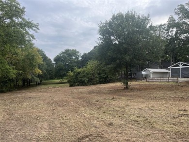 This is a .64 Acre lot with lake view, not a house. Cedar Creek on Cedar Creek Country Club in Texas - for sale on GolfHomes.com, golf home, golf lot