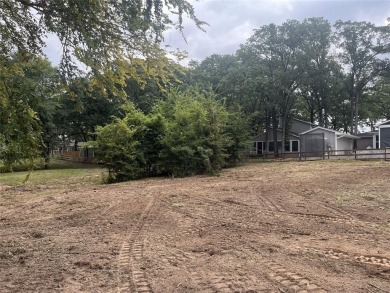 This is a .64 Acre lot with lake view, not a house. Cedar Creek on Cedar Creek Country Club in Texas - for sale on GolfHomes.com, golf home, golf lot