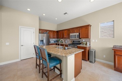 Check out this beautiful 1,966 sf 3-bedroom, plus den/office on Laughlin Ranch Golf Club in Arizona - for sale on GolfHomes.com, golf home, golf lot