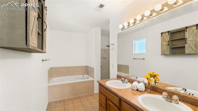 Nestled in the sought-after Woodmen Hills neighborhood, this on Antler Creek Golf Course in Colorado - for sale on GolfHomes.com, golf home, golf lot