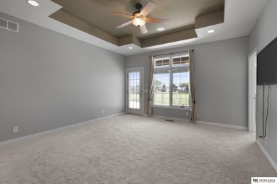 Welcome to this elegant 4 bed, 5 bath walkout ranch home located on Wilderness Ridge Golf Club in Nebraska - for sale on GolfHomes.com, golf home, golf lot