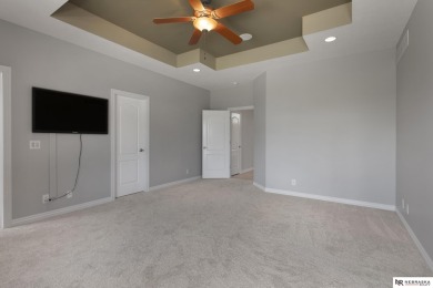 Welcome to this elegant 4 bed, 5 bath walkout ranch home located on Wilderness Ridge Golf Club in Nebraska - for sale on GolfHomes.com, golf home, golf lot