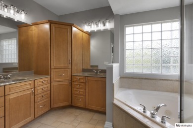 Welcome to this elegant 4 bed, 5 bath walkout ranch home located on Wilderness Ridge Golf Club in Nebraska - for sale on GolfHomes.com, golf home, golf lot