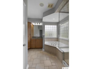 Welcome to this elegant 4 bed, 5 bath walkout ranch home located on Wilderness Ridge Golf Club in Nebraska - for sale on GolfHomes.com, golf home, golf lot
