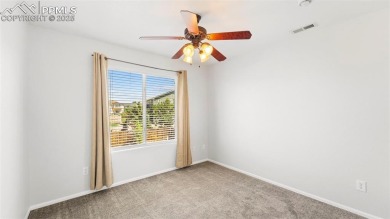 Nestled in the sought-after Woodmen Hills neighborhood, this on Antler Creek Golf Course in Colorado - for sale on GolfHomes.com, golf home, golf lot