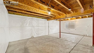 Nestled in the sought-after Woodmen Hills neighborhood, this on Antler Creek Golf Course in Colorado - for sale on GolfHomes.com, golf home, golf lot