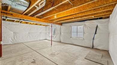 Nestled in the sought-after Woodmen Hills neighborhood, this on Antler Creek Golf Course in Colorado - for sale on GolfHomes.com, golf home, golf lot
