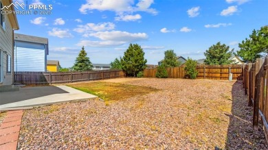 Nestled in the sought-after Woodmen Hills neighborhood, this on Antler Creek Golf Course in Colorado - for sale on GolfHomes.com, golf home, golf lot