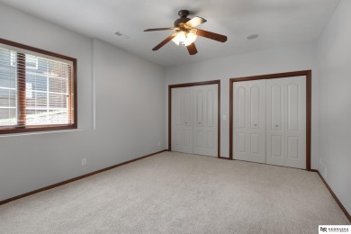 Welcome to this elegant 4 bed, 5 bath walkout ranch home located on Wilderness Ridge Golf Club in Nebraska - for sale on GolfHomes.com, golf home, golf lot