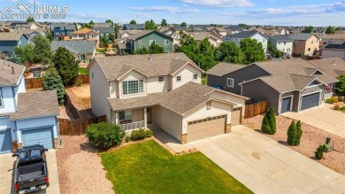 Nestled in the sought-after Woodmen Hills neighborhood, this on Antler Creek Golf Course in Colorado - for sale on GolfHomes.com, golf home, golf lot