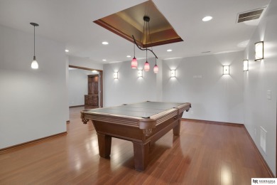 Welcome to this elegant 4 bed, 5 bath walkout ranch home located on Wilderness Ridge Golf Club in Nebraska - for sale on GolfHomes.com, golf home, golf lot