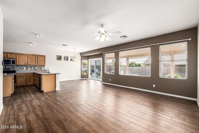 Spacious, open floor plan with kitchen and family room open to on Springfield Golf Resort in Arizona - for sale on GolfHomes.com, golf home, golf lot