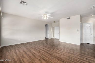 Spacious, open floor plan with kitchen and family room open to on Springfield Golf Resort in Arizona - for sale on GolfHomes.com, golf home, golf lot