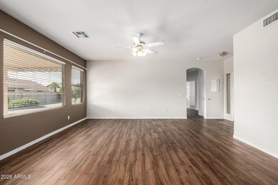 Spacious, open floor plan with kitchen and family room open to on Springfield Golf Resort in Arizona - for sale on GolfHomes.com, golf home, golf lot