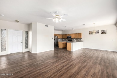 Spacious, open floor plan with kitchen and family room open to on Springfield Golf Resort in Arizona - for sale on GolfHomes.com, golf home, golf lot