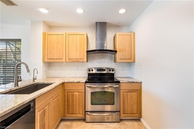 Step into this beautifully updated 2 bedroom + den, 2 bath on Estero Country Club in Florida - for sale on GolfHomes.com, golf home, golf lot