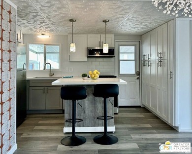 Welcome to this beautifully updated 2 bed 2 bath mobile home on Cathedral Canyon Golf and Tennis Club in California - for sale on GolfHomes.com, golf home, golf lot