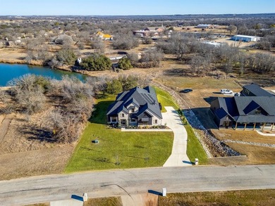 Completed in 2024 and now offered $40K below recent appraisal on Sugar Tree Golf and Country Club in Texas - for sale on GolfHomes.com, golf home, golf lot