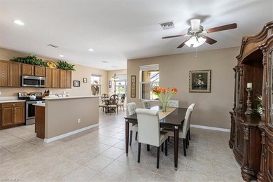 This 4-bed plus den, 2.5-bath two-story residence in Valencia on Valencia Golf and Country Club in Florida - for sale on GolfHomes.com, golf home, golf lot