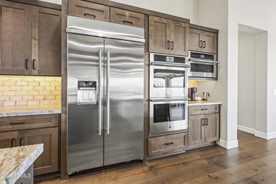 Perched on a hilltop overlooking the golf course, this on Wickenburg Ranch Golf Course in Arizona - for sale on GolfHomes.com, golf home, golf lot