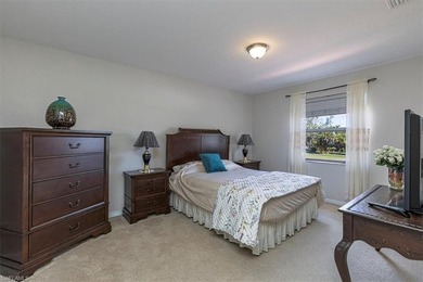 This 4-bed plus den, 2.5-bath two-story residence in Valencia on Valencia Golf and Country Club in Florida - for sale on GolfHomes.com, golf home, golf lot