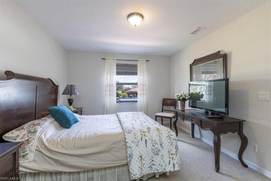 This 4-bed plus den, 2.5-bath two-story residence in Valencia on Valencia Golf and Country Club in Florida - for sale on GolfHomes.com, golf home, golf lot