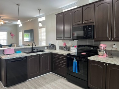 This lovely, 2015 manufactured 3-bedroom home, is an age 40+ and on Lake Fairways Country Club in Florida - for sale on GolfHomes.com, golf home, golf lot