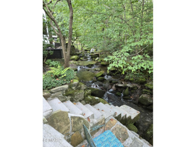 Absolutely beautiful creek front lot with a concrete deck and on Bent Creek Golf Course in Tennessee - for sale on GolfHomes.com, golf home, golf lot