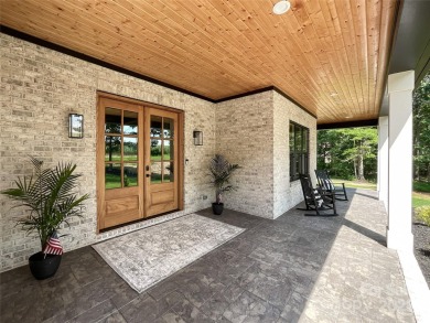 Discover this stunning custom-built farmhouse nestled on 3.27 on Eagle Chase Golf Club in North Carolina - for sale on GolfHomes.com, golf home, golf lot