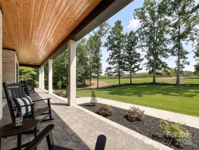 Discover this stunning custom-built farmhouse nestled on 3.27 on Eagle Chase Golf Club in North Carolina - for sale on GolfHomes.com, golf home, golf lot