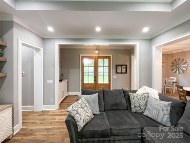 Discover this stunning custom-built farmhouse nestled on 3.27 on Eagle Chase Golf Club in North Carolina - for sale on GolfHomes.com, golf home, golf lot
