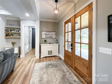 Discover this stunning custom-built farmhouse nestled on 3.27 on Eagle Chase Golf Club in North Carolina - for sale on GolfHomes.com, golf home, golf lot