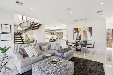 Experience sweeping Strip and mountain views from this elegant on Dragon Ridge Country Club in Nevada - for sale on GolfHomes.com, golf home, golf lot