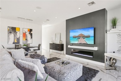 Experience sweeping Strip and mountain views from this elegant on Dragon Ridge Country Club in Nevada - for sale on GolfHomes.com, golf home, golf lot