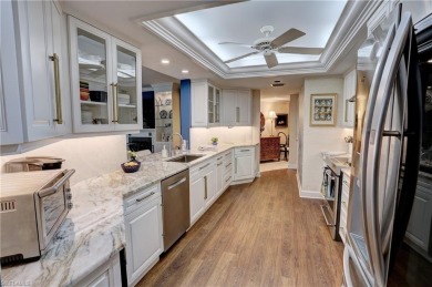 Elegant 1st floor corner condo with large lanai overlooking lake on Wyndemere Country Club in Florida - for sale on GolfHomes.com, golf home, golf lot