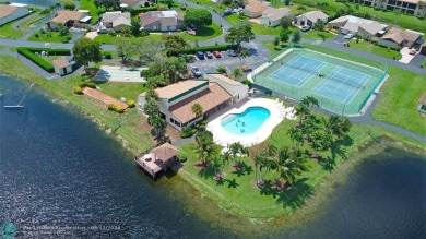 Spacious Gated two bedrooms, two bath single family home with a on Cypress Creek Country Club - Boynton Beach in Florida - for sale on GolfHomes.com, golf home, golf lot