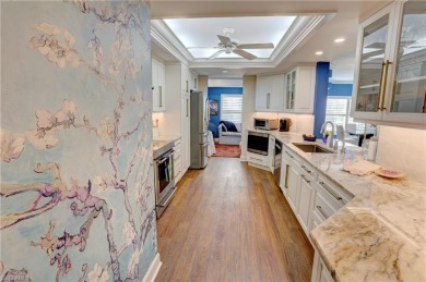 Elegant 1st floor corner condo with large lanai overlooking lake on Wyndemere Country Club in Florida - for sale on GolfHomes.com, golf home, golf lot