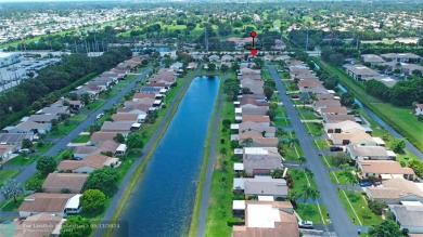 Spacious Gated two bedrooms, two bath single family home with a on Cypress Creek Country Club - Boynton Beach in Florida - for sale on GolfHomes.com, golf home, golf lot