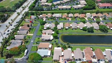 Spacious Gated two bedrooms, two bath single family home with a on Cypress Creek Country Club - Boynton Beach in Florida - for sale on GolfHomes.com, golf home, golf lot