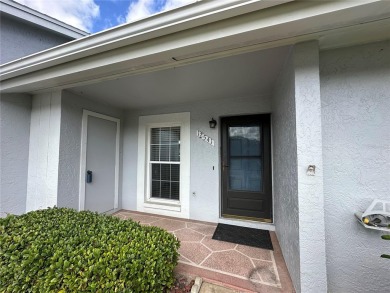 Enjoy the ease of maintenance-free living in this charming and on Beacon Woods Golf Club in Florida - for sale on GolfHomes.com, golf home, golf lot