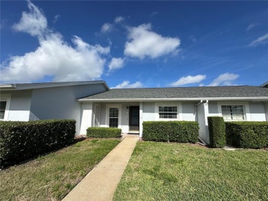 Enjoy the ease of maintenance-free living in this charming and on Beacon Woods Golf Club in Florida - for sale on GolfHomes.com, golf home, golf lot
