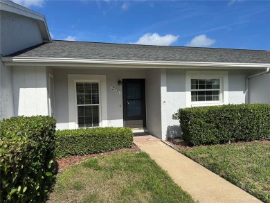 Enjoy the ease of maintenance-free living in this charming and on Beacon Woods Golf Club in Florida - for sale on GolfHomes.com, golf home, golf lot