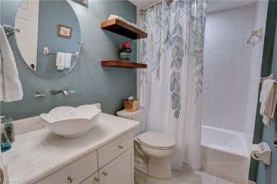 Elegant 1st floor corner condo with large lanai overlooking lake on Wyndemere Country Club in Florida - for sale on GolfHomes.com, golf home, golf lot