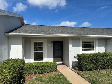 Enjoy the ease of maintenance-free living in this charming and on Beacon Woods Golf Club in Florida - for sale on GolfHomes.com, golf home, golf lot